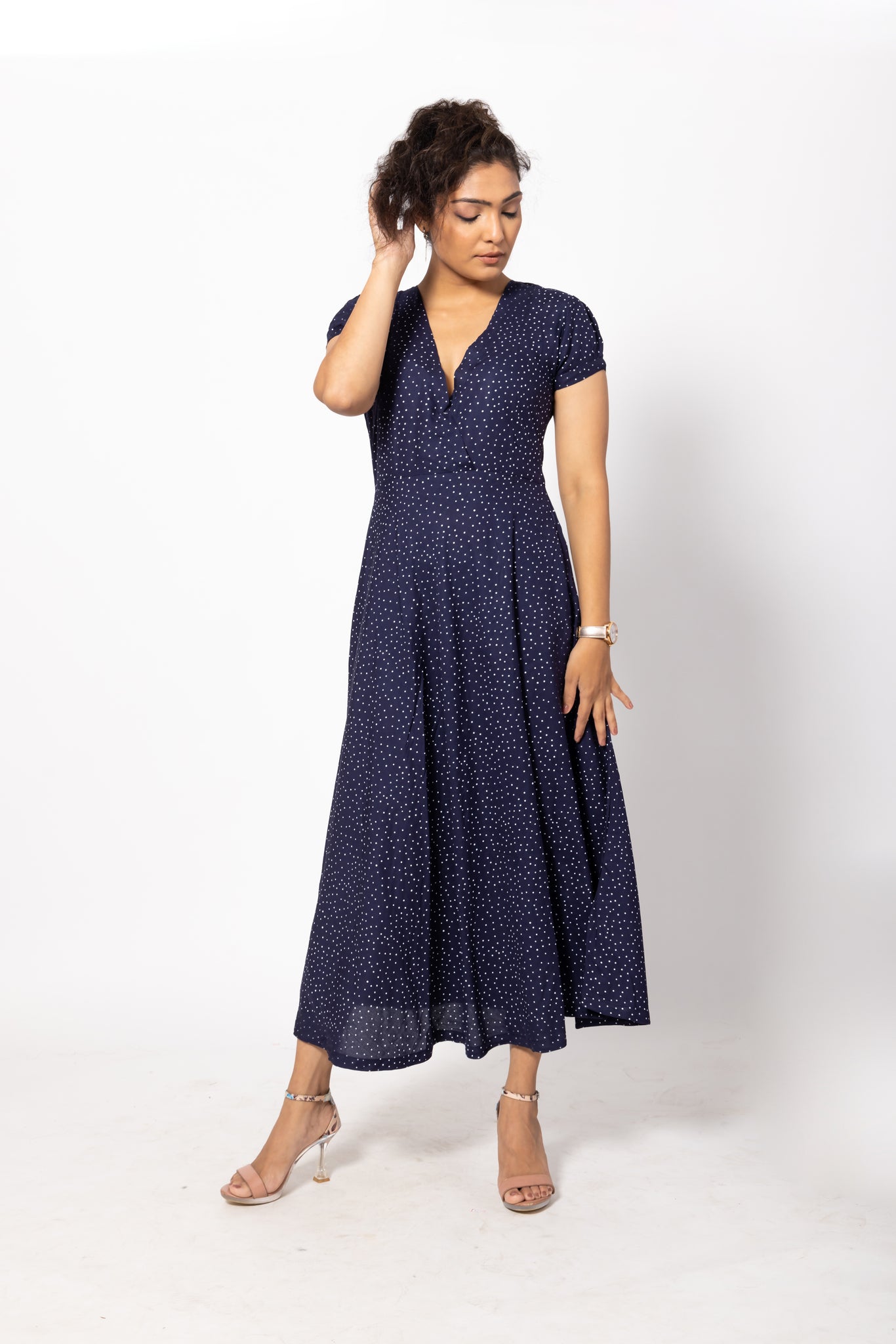 Polka Dotted Navy Blue Maxi Dress with a Deep V-Neck